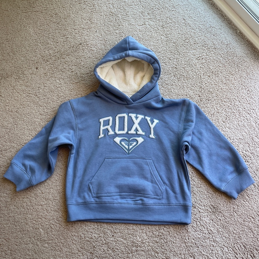 NWT Roxy Blue Infinity Hoodie. Size 7 youth.